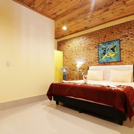 Tuk Tuk Timbul Bungalows Habitación foto